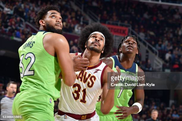 Karl-Anthony Towns of the Minnesota Timberwolves, Jarrett Allen of the Cleveland Cavaliers and Anthony Edwards of the Minnesota Timberwolves wait for...