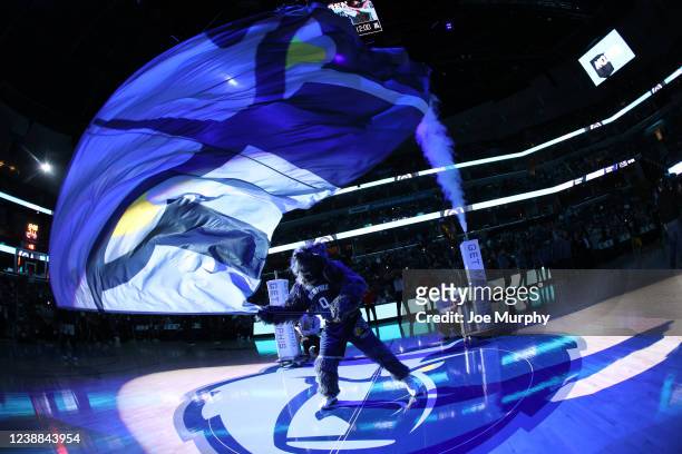 Mascot Grizz of the Memphis Grizzlies waves the flag before the game against the San Antonio Spurs on February 28, 2022 at FedExForum in Memphis,...