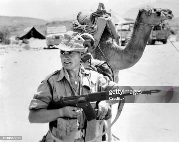 Picture released on May 6, 1964 of a British soldier fighting against the rebel tribes positions in the Radfan Hills, part of a British protectorate...