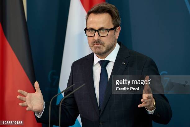 Luxembourg's Prime Minister Xavier Bettel attend a news conference with German Chancellor Olaf Scholz at the Chancellery on March 1, 2022 in Berlin,...