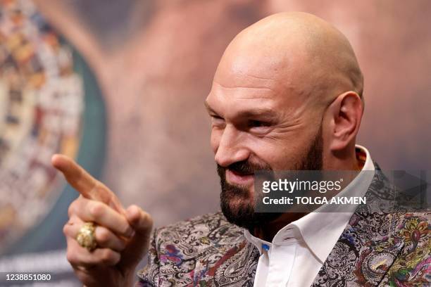 World Boxing Council heavyweight title holder Britain's Tyson Fury reacts during a press conference at Wembley Stadium in west London on March 1,...