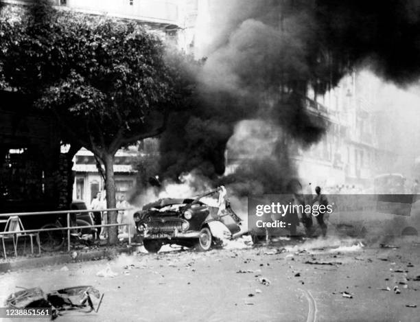 Car bomb is in flames, on September 22, 1960 in Algiers, after a car bomb attack on rue Charles Peguy, at the corner of rue Charras and rue Monge in...