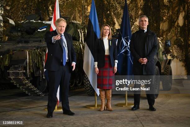 British Prime Minister Boris Johnson reacts during a joint press conference with Prime Minister of Estonia, Kaja Kallas and Jens Stoltenberg,...