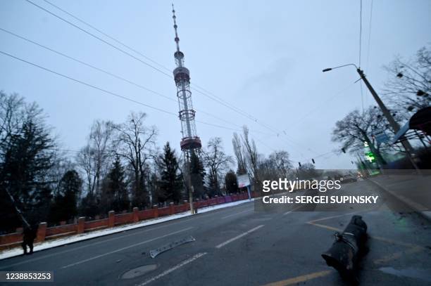 Photograph taken on March 1, 2022 shows a fragment of missile after an airstrike that hit Kyiv's main television tower in Kyiv. - An apparent Russian...