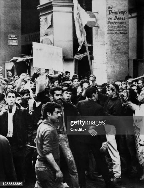 Thousands of Algerian Muslims demonstrate on December 15, 1960 in the European quarters of Algiers shouting "Yahia de Gaulle", "Algerian Algeria" and...