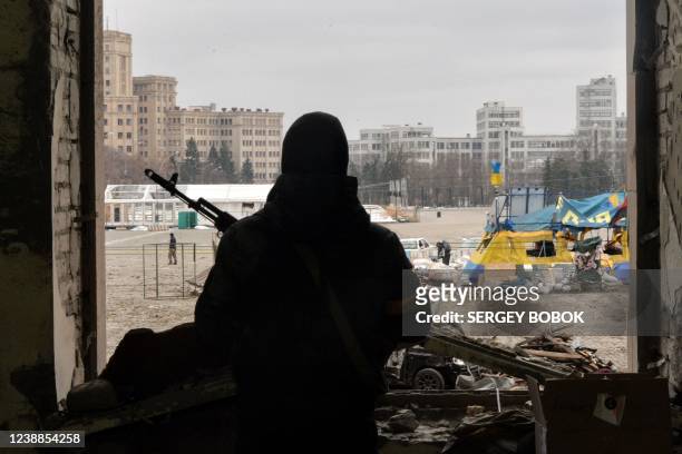 View of the square outside the damaged local city hall of Kharkiv on March 1 destroyed as a result of Russian troop shelling. - The central square of...
