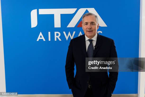 Airways newborn Italian air company's chairman Alfredo Altavilla poses for pictures at Fiumicino's international airport after attending an event for...