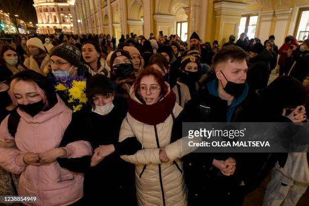 People march to protest against Russia's invasion of Ukraine in central Saint Petersburg on March 1, 2022.