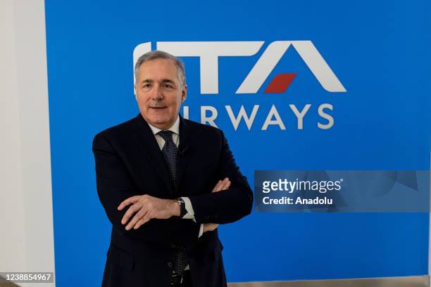 Airways newborn Italian air company's chairman Alfredo Altavilla poses for pictures at Fiumicino's international airport after attending an event for...