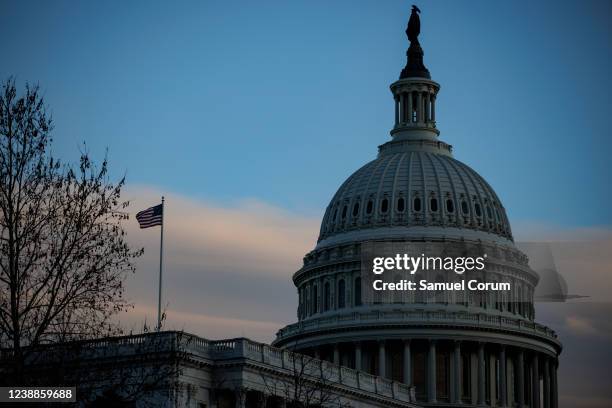 The U.S. Capitol building is seen at sunset ahead of President Joe Biden's first State of the Union address to Congress on March 1, 2022 in...