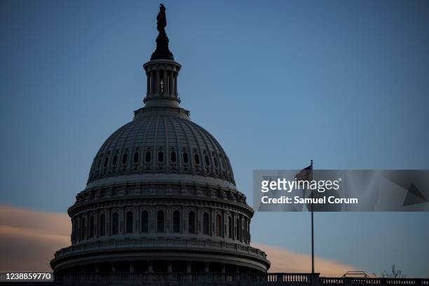 The U.S. Capitol building is seen at sunset ahead of President Joe Biden's first State of the Union address to Congress on March 1, 2022 in...