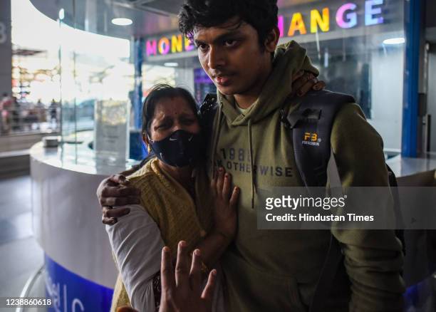 Stranded Indian student in Ukraine reunited with their family upon arrival at Indira Gandhi International Airport, on March 1, 2022 in New Delhi,...