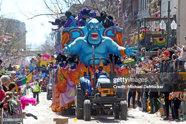 The 1,500 members of the Krewe of Zulu make their way down St. Charles Avenue on Mardi Gras Day with their 44-float parade entitled Zulu Salutes...