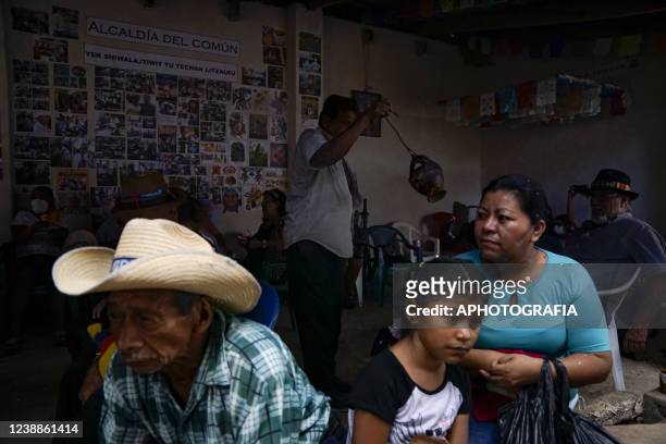 Revelers awaits for a ritual during the celebration of 'Fiesta de las Comadres', also known as 'Martes de Carnaval' in municipality Izalco, on March...