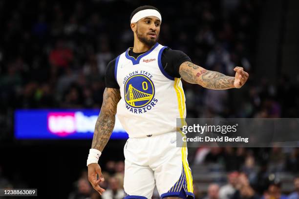 Gary Payton II of the Golden State Warriors celebrates after making a three-point shot against the Minnesota Timberwolves in the second quarter of...