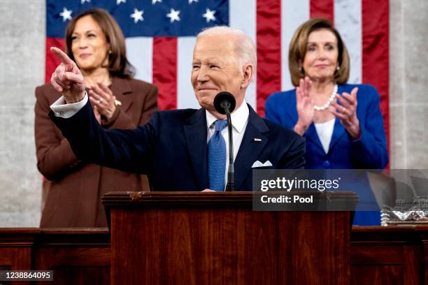 President Joe Biden delivers the State of the Union address as U.S. Vice President Kamala Harris and House Speaker Nancy Pelosi look on during a...