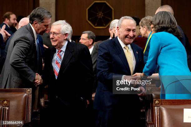 Senate Minority Leader Mitch McConnell and Senate Majority Leader Chuck Schumer arrive for US President Joe Biden's the State of the Union address to...