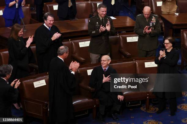 Supreme Court Chief Justice John Roberts and Associate Justices Amy Coney Barrett, Brett Kavanaugh and Elena Kagan as well as U.S. Army Chief of...