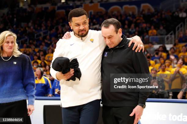 Pittsburgh, PA Pittsburgh Panthers coach Jeff Capel walks on the court with Duke Blue Devils coach Mike Krzyzewski to present Coach K with a fist...