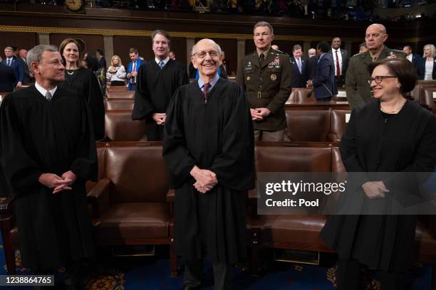 Supreme Court Chief Justice John Roberts and Justices Stephen Breyer and Elena Kagan attend the State of the Union address by President Joe Biden to...