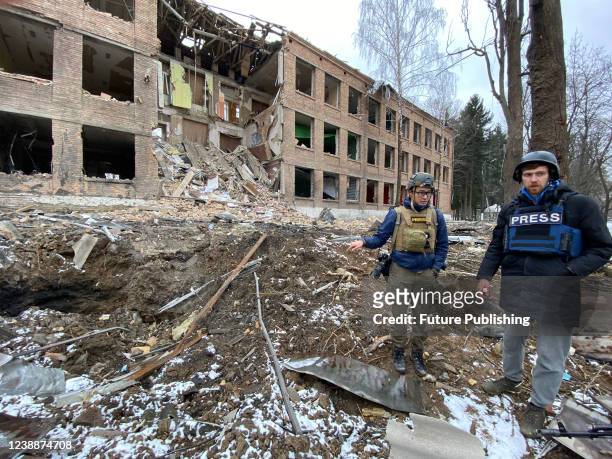 Journalists visit the site of the rocket attack launched by Russian invaders that hit the building of the Vasylkiv Professional College situated on...