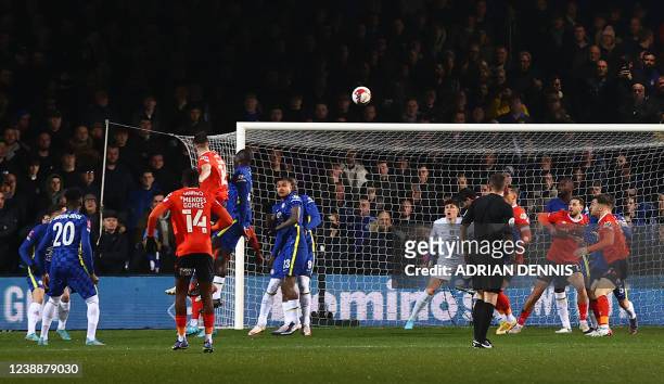 Luton Town's English defender Reece Burke scores his team's first goal during the English FA Cup fifth round football match between Luton Town and...