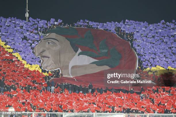 Fans of ACF Fiorentina with the banner of The poet Dante and the hell of the divine comedy during the Coppa Italia Semi Final 1st Leg match between...