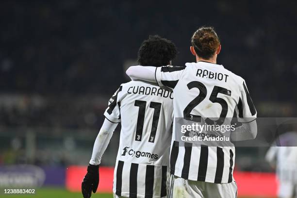 Juventus' players Rabiot and Juan Cuadrado celebrate after scoring a goal during the Italian Cup semi final soccer match between ACF Fiorentina and...