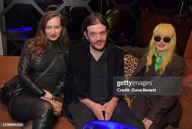Lou Hayter, Jamie Reynolds and Pam Hogg attend the Fontaines D.C. NME after party supported by Wild Spring at Oscar's on March 2, 2022 in London,...