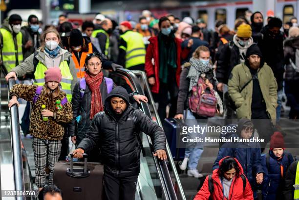 People fleeing war-torn Ukraine arrive on a train from Warsaw at Hauptbahnhof main railway station on March 2, 2022 in Berlin, Germany. Hundreds of...