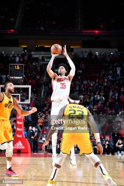 Christian Wood of the Houston Rockets shoots a three point basket to send the game against the Utah Jazz into overtime on March 2, 2022 at the Toyota...