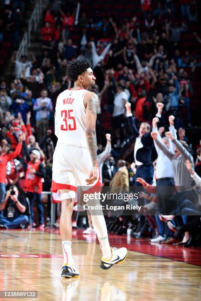 Christian Wood of the Houston Rockets celebrates shooting a three point basket to send the game against the Utah Jazz into overtime on March 2, 2022...