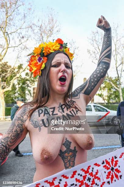 Image contains nudity) Activist of feminist group FEMEN protesting bare-chested in front of the Russian Embassy, in Madrid, Spain, on March 3, 2022....