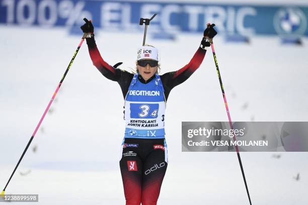 Norway's Ingrid Landmark Tandrevold celebrates after Team Norway wins the women's 4x6 km relay competition of the IBU World Cup Biathlon event in...