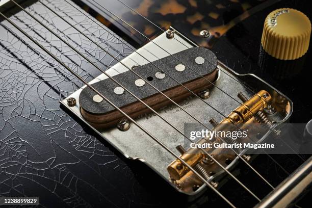 Detail of the Gotoh bridge and Mojo 52 single coil pickup on a Kithara Harland electric guitar, taken on January 11, 2021.