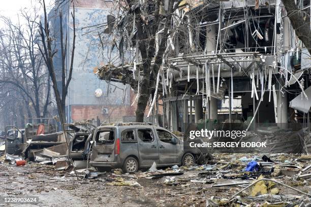 View of a damaged building, which is said was hit by recent shelling, in Ukraine's second-biggest city of Kharkiv on March 3, 2022. - Ukraine and...