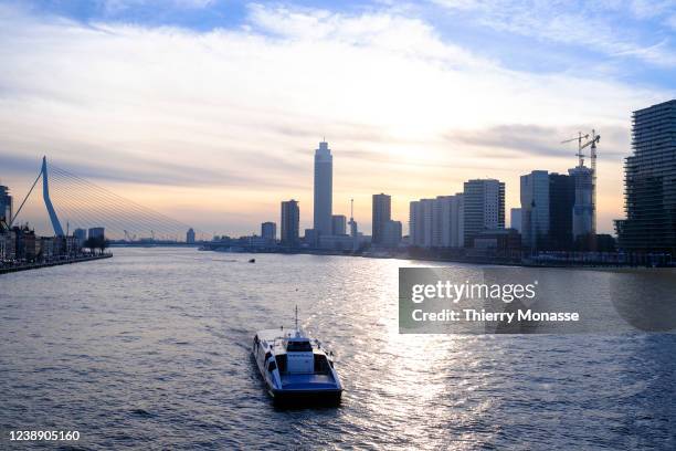 The Nieuwe Maas is seen from the Willemsbrug on March 2, 2022 in Rotterdam, Netherlands. A Water Bus, a public transport, sails between...