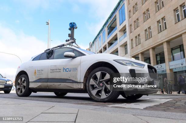 March 2022, Hamburg: A vehicle from the Internet company Google in the city center. The electric car with sensor technology is to measure air...