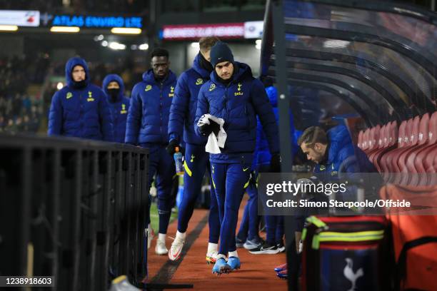 Sergio Reguilon of Tottenham Hotspur takes his seat on the substitutes' bench for the Premier League match between Burnley and Tottenham Hotspur at...