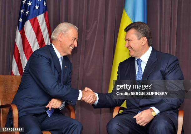 Vice President Joe Biden shakes hands with Ukraine's main opposition leader Viktor Yanukovych during their meeting on July 21, 2009 in Kiev. Biden is...