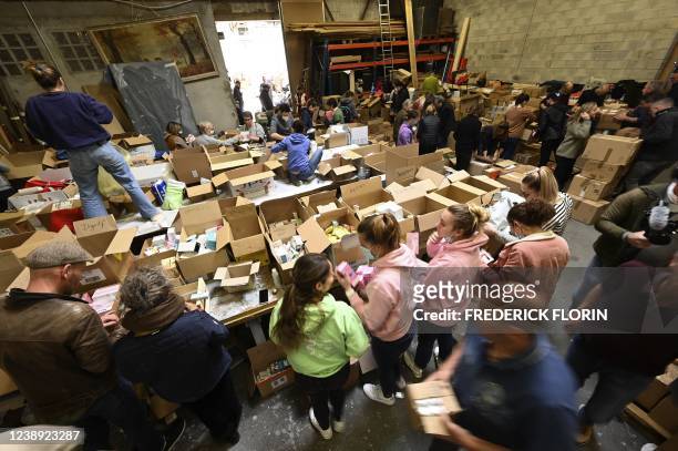Volunteers organise supplies collected from around the country before sending them to Poland for Ukrainian refugees, following Russia's invasion of...
