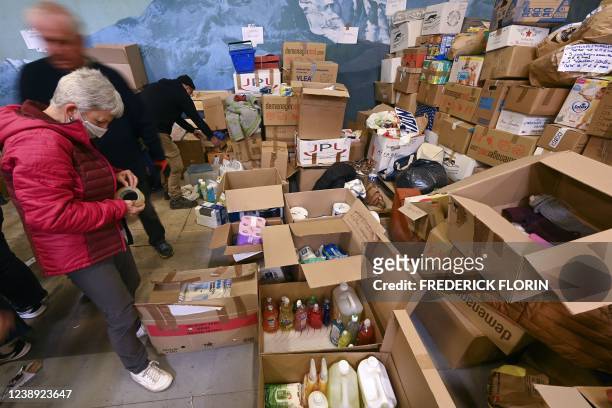 Volunteers organise supplies collected from around the country before sending them to Poland for Ukrainian refugees, following Russia's invasion of...