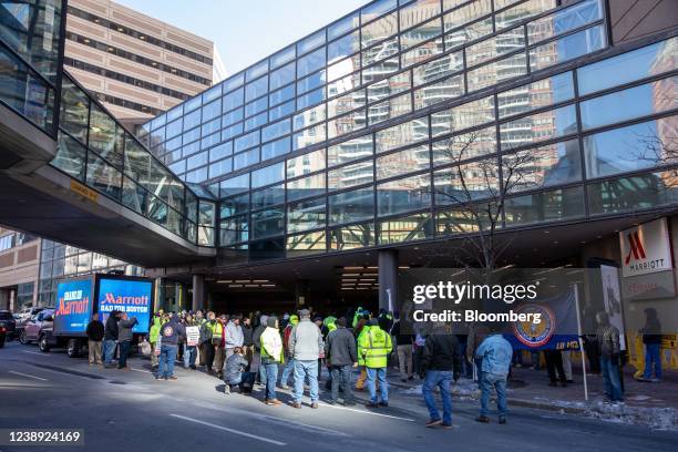 Workers during a strike outside the Marriott Copley Place Hotel in Boston, Massachusetts, U.S., on Friday, March 4, 2022. Other unions have joined in...
