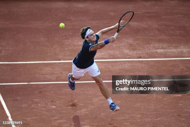 Brazilian tennis player Thiago Seyboth Wild loses a ball during a Davis Cup tennis match against German Alexander Zverev at the Rio 2016 Olympic Park...