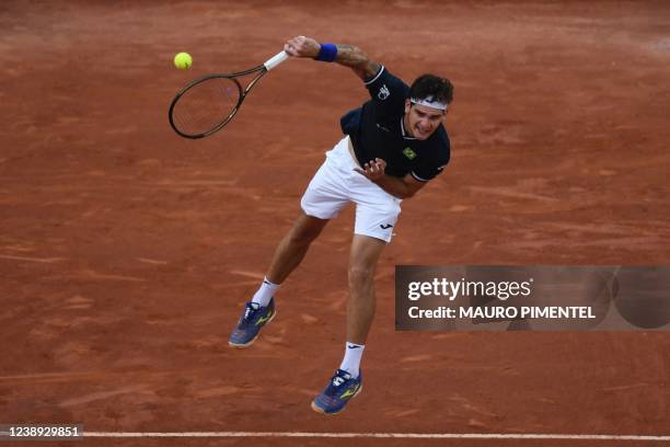 Brazilian tennis player Thiago Seyboth Wild returns the ball during a Davis Cup tennis match against German Alexander Zverev at the Rio 2016 Olympic...