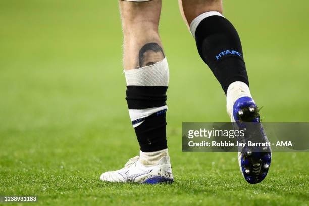 Snippet of a tattoo on the calf of Danny Ward of Huddersfield Town of former Huddersfield Town player and late good friend of Danny Ward, Jordan...
