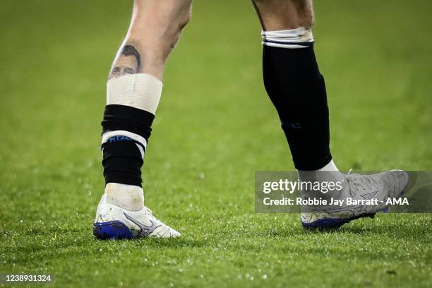 Snippet of a tattoo on the calf of Danny Ward of Huddersfield Town of former Huddersfield Town player and late good friend of Danny Ward, Jordan...