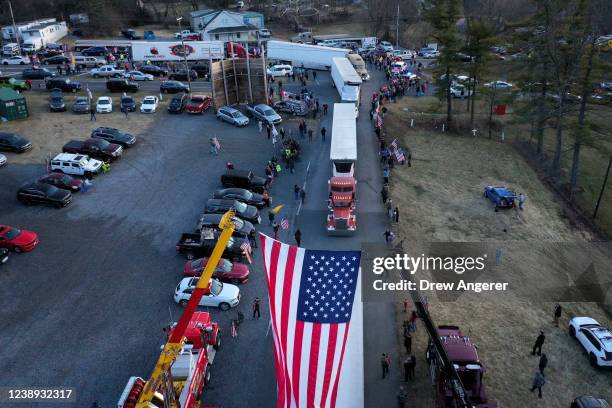 In an aerial view, the Peoples Convoy of truckers arrives near the Hagerstown Speedway on March 4, 2022 in Hagerstown, Maryland. The convoy, modeled...