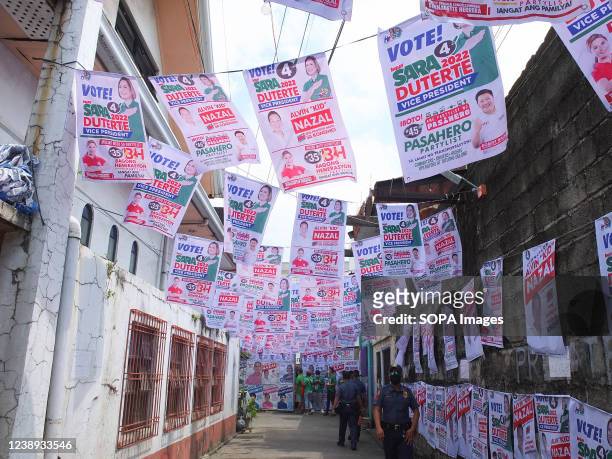 Campaign posters of the Vice Presidential aspirant Sara Duterte with alliance in different party list groups hang at the Nazal Compound. Presidential...