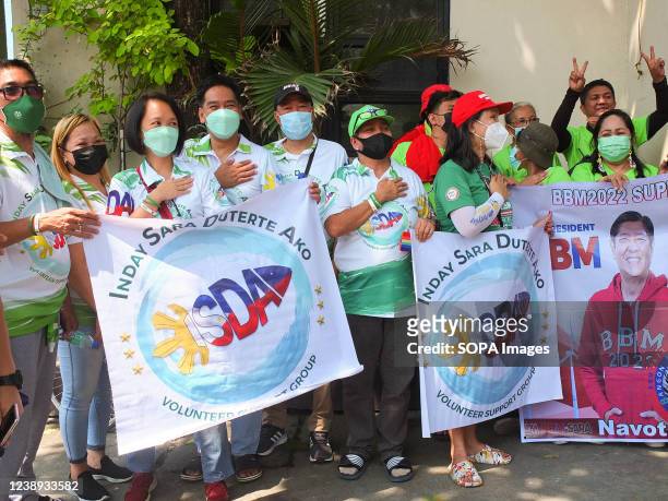 Mayor Sara Duterte's supporters hold banners during the event. Presidential daughter and Davao City Mayor Sara Duterte-Carpio visit Navotas City. It...